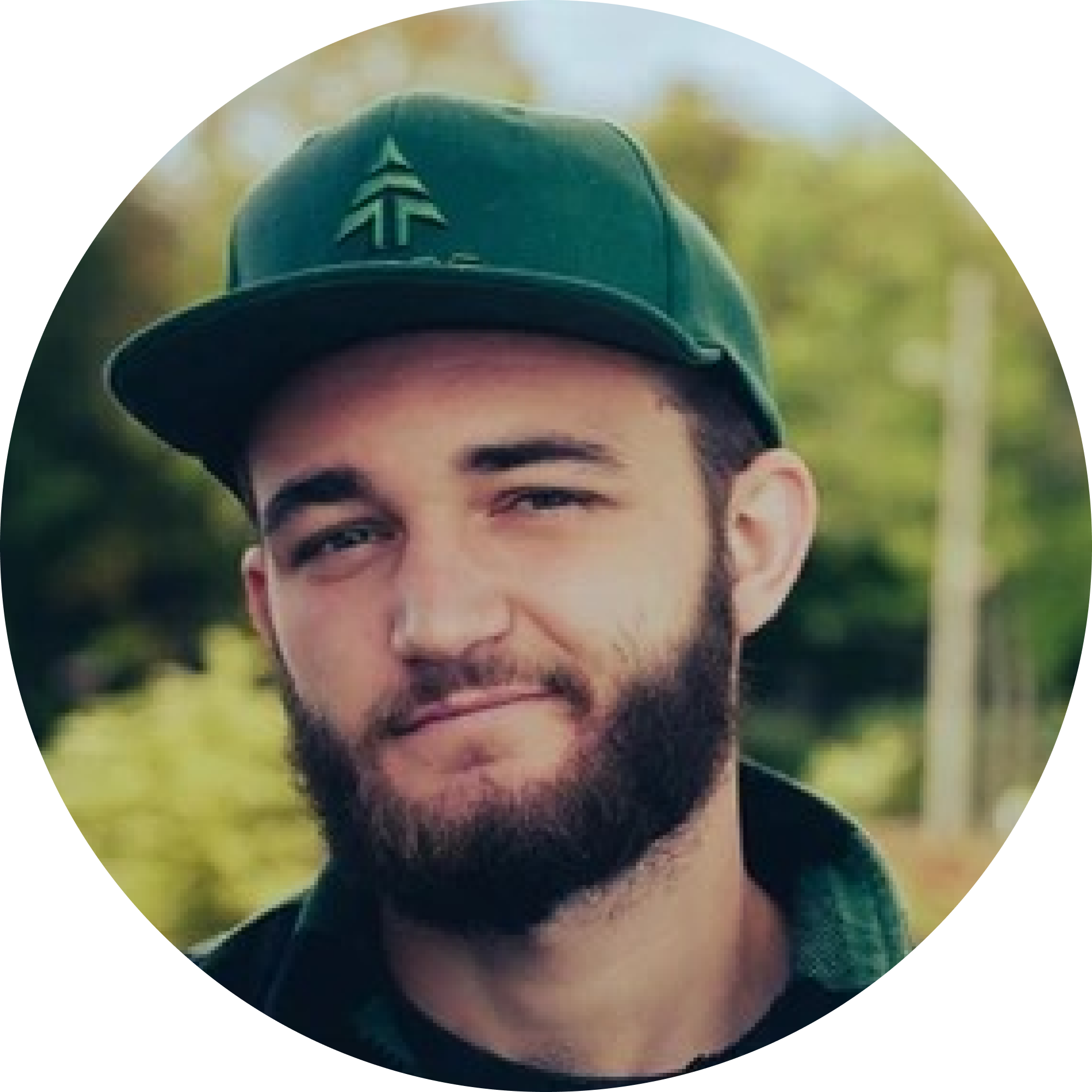 man wearing green cap profile picture